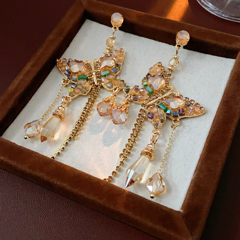 Gilded Wings: Crystal Butterfly Tassel Earrings