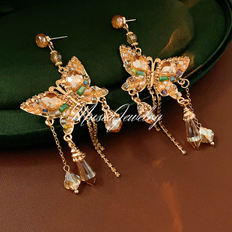 Gilded Wings: Crystal Butterfly Tassel Earrings