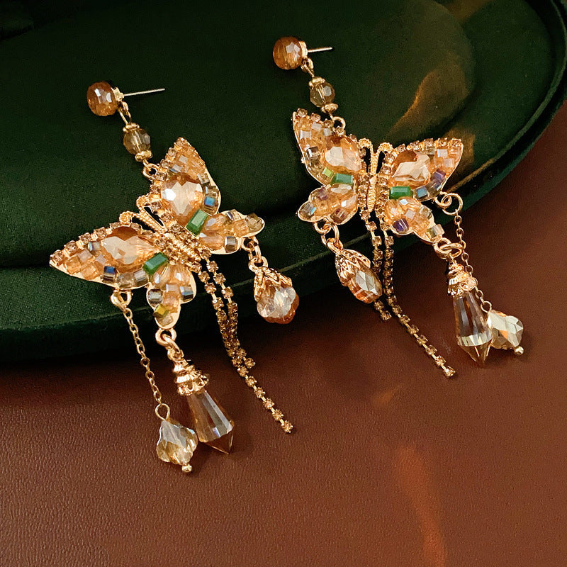 Gilded Wings: Crystal Butterfly Tassel Earrings