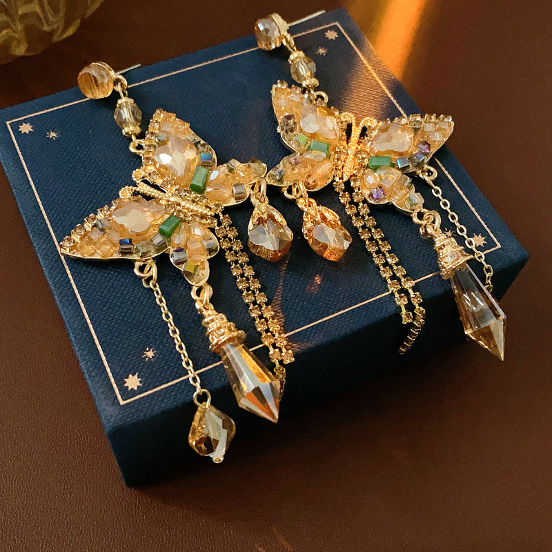 Gilded Wings: Crystal Butterfly Tassel Earrings